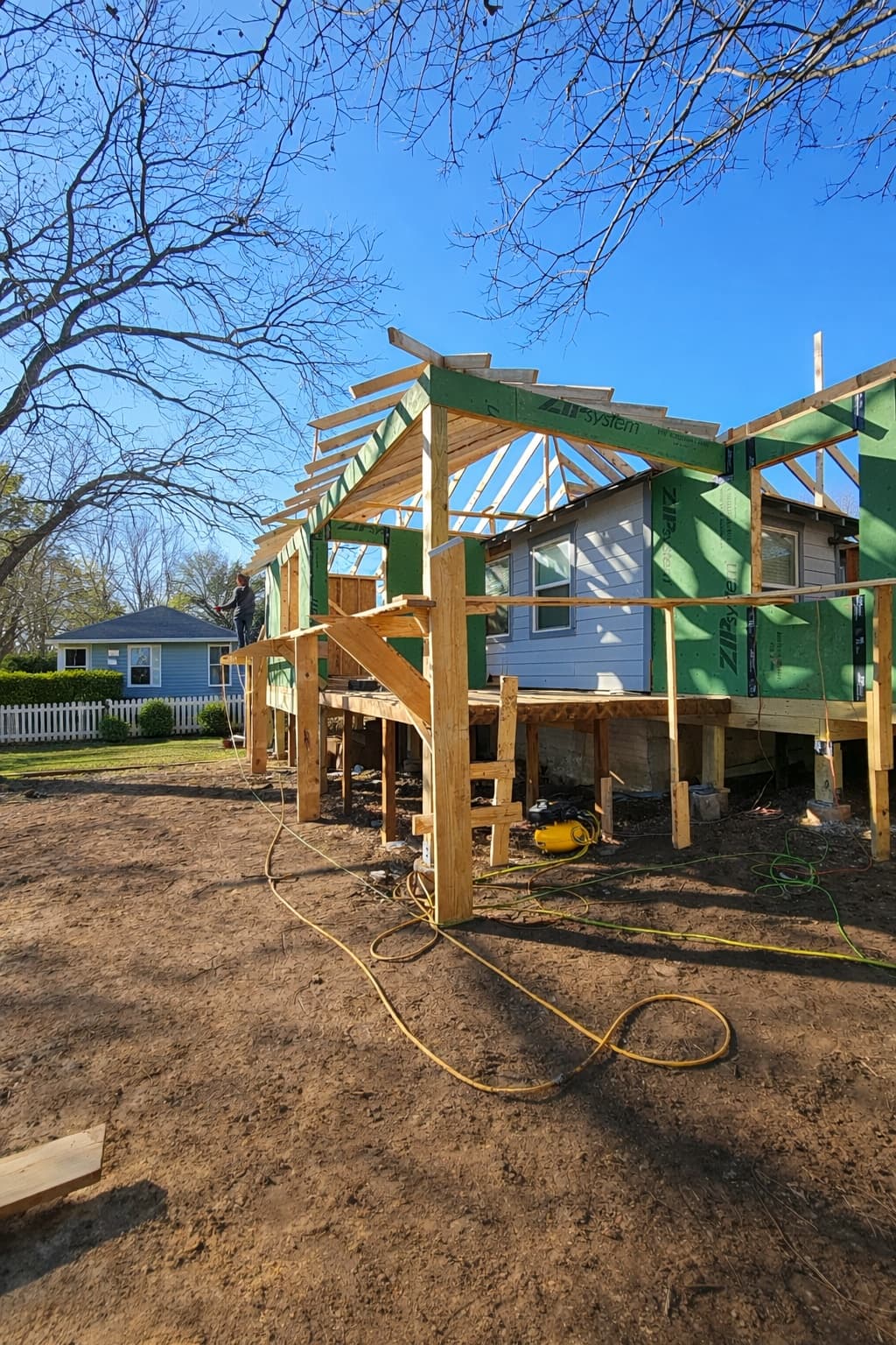 Home addition framing in progress in Dallas-Fort Worth by Genco Construction