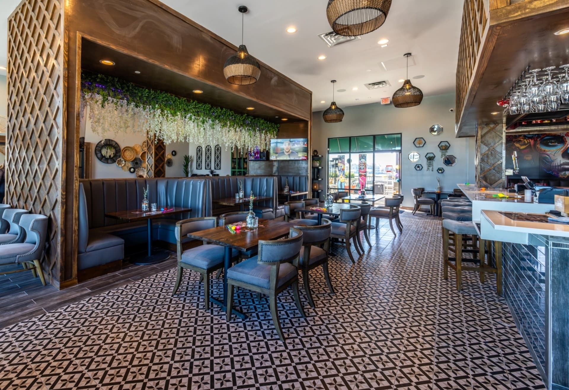 Restaurant dining room build-out with pattern tile and booth seating