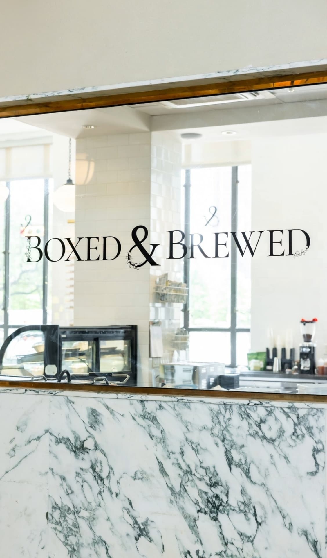 Boxed and Brewed service counter marble and glass detail