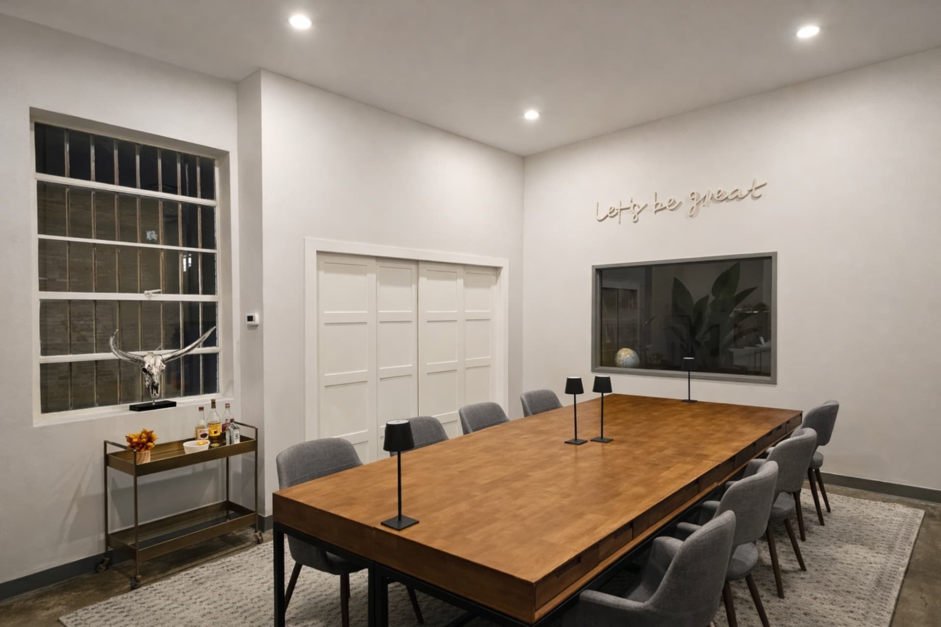 Boxwood Hospitality boardroom with neon signage Design District Dallas