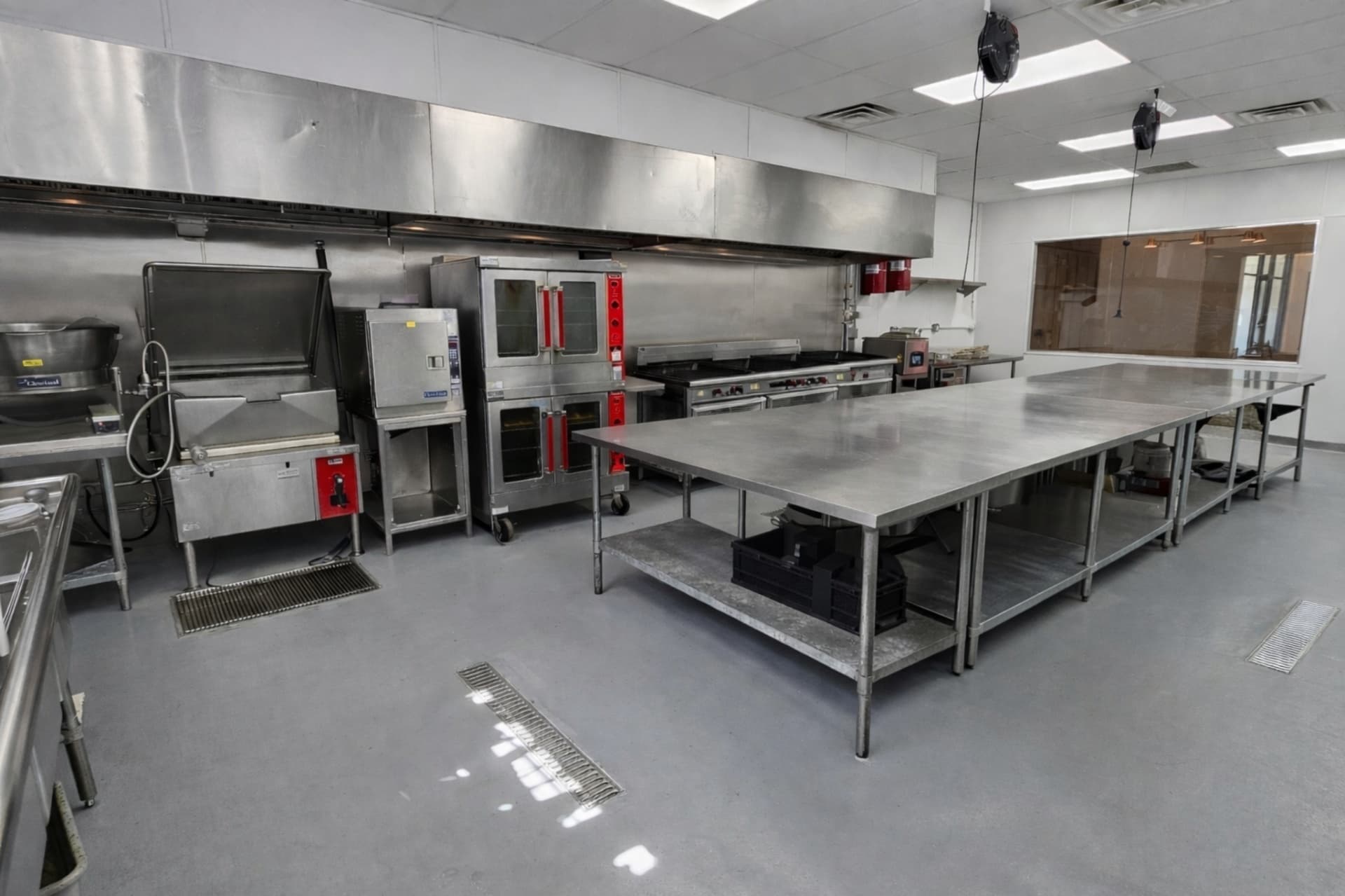 Boxwood Hospitality commercial kitchen prep area with stainless equipment