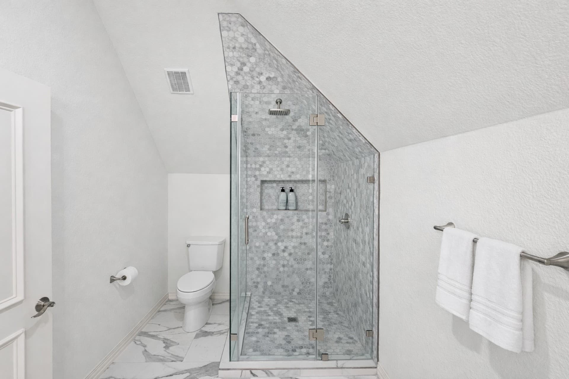 Colleyville TX attic bathroom glass shower hexagon tile