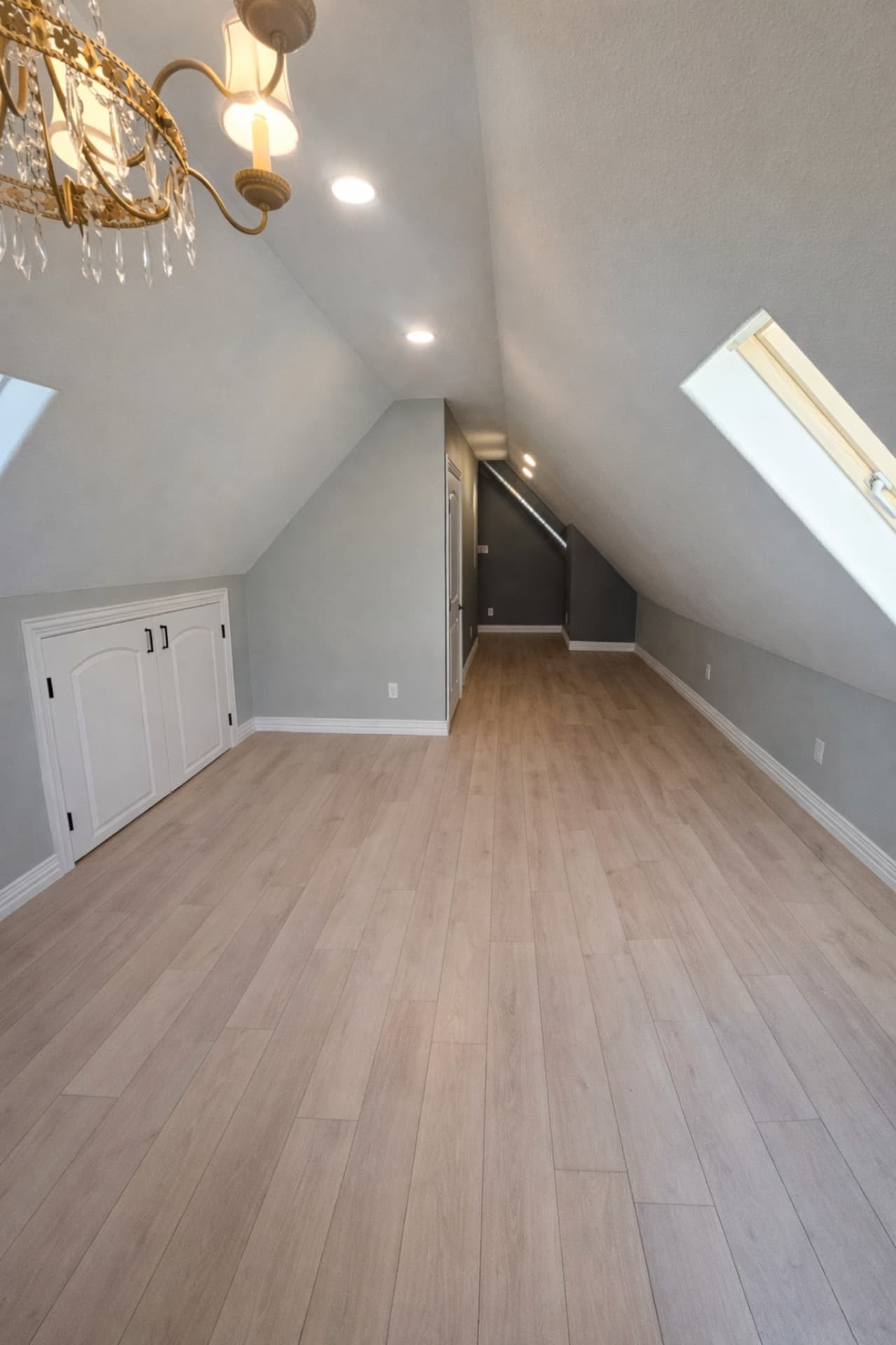 Grapevine TX attic conversion open space with skylight and built-in storage