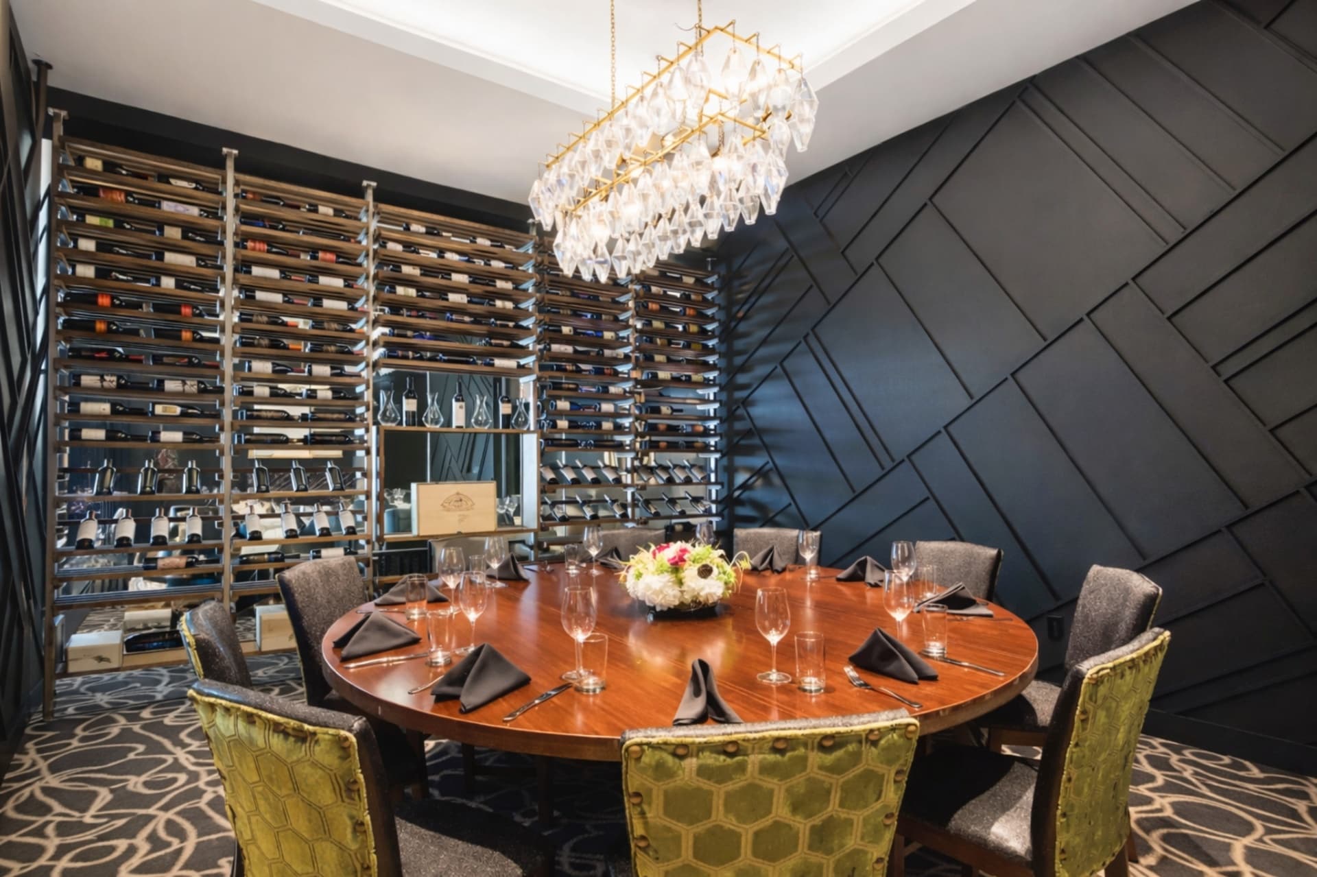 LVI Steak House private dining wine room with decorative wall treatment
