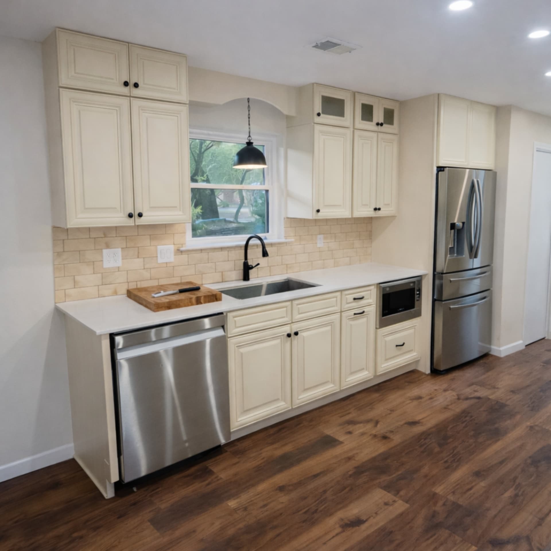 Richardson kitchen remodel island cooktop with pendant lighting